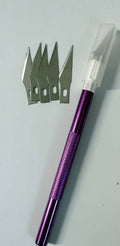 Cutter morado 5 cuchillas extras.